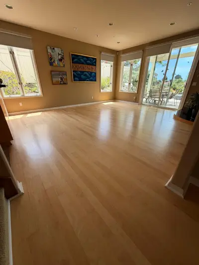 Bright refinished floor with ocean-view windows